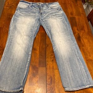 Mens buckle jeans.